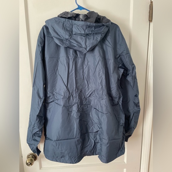 Crane packable rain jacket. Size L. Never worn. - Picture 2 of 4